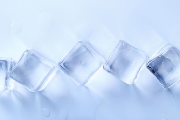 Free photo ice cubes on white surface