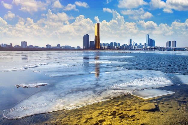 Ice of Han river and cityscape in winter,Seoul in South Korea.