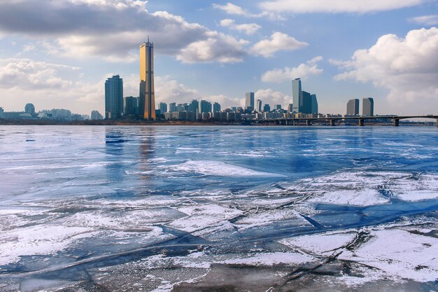 Ice of Han river and cityscape in winter,Sunset in Seoul, South Korea.