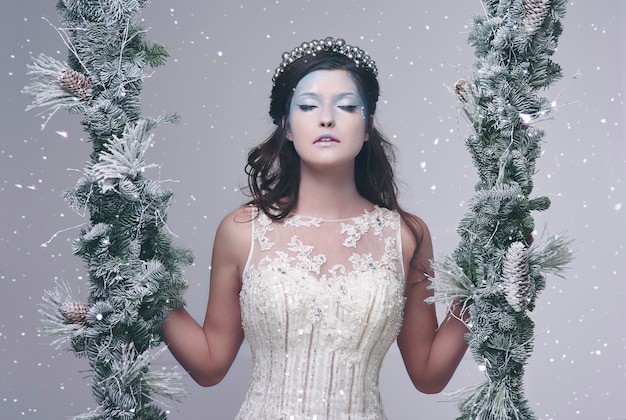 Free photo ice queen in wintry landscape