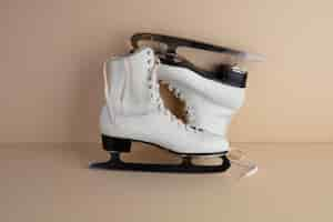 Free photo ice skates in studio still life