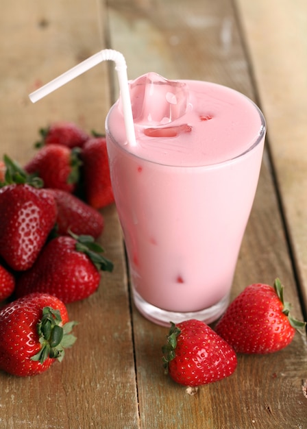 Iced pink cocktail and fresh strawberries