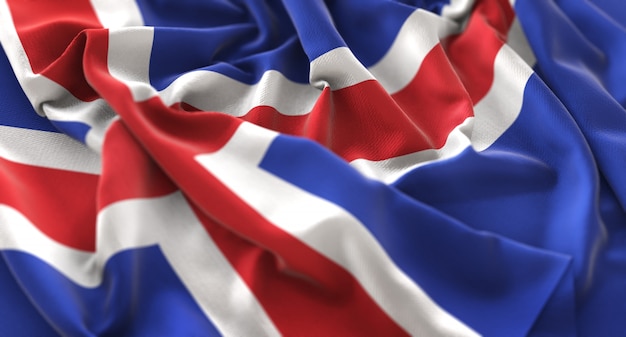 Исландский флаг украшен красиво размахивая макровом крупным планом