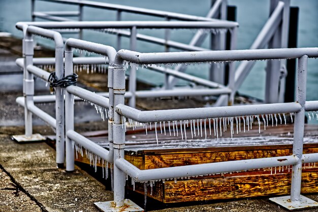 Icicles hanging on the metal fence  in Chicago