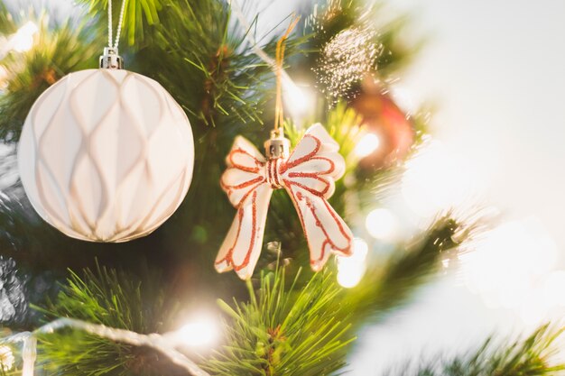 Illuminated christmas tree with ball