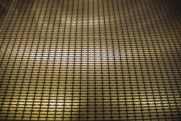 Illuminated wall with metallic pattern background