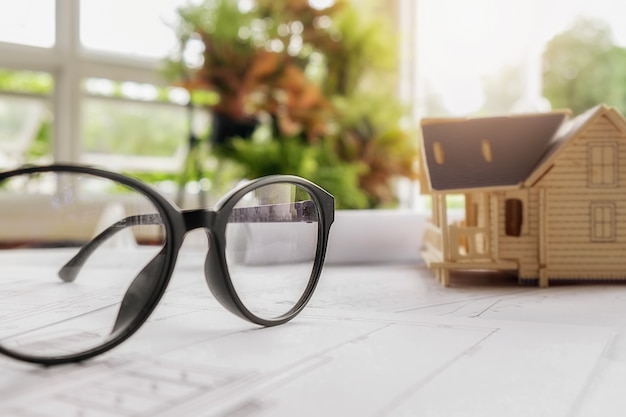 Free photo image of engineering objects on workplace top view.construction concept. engineering tools.vintage tone retro filter effect,soft focus(selective focus)