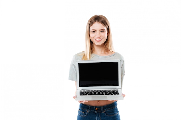 Image of woman showing laptop computer