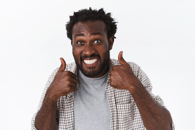 Impressed, excited happy, funny african-american bearded guy totally agrees with awesome choice or plan