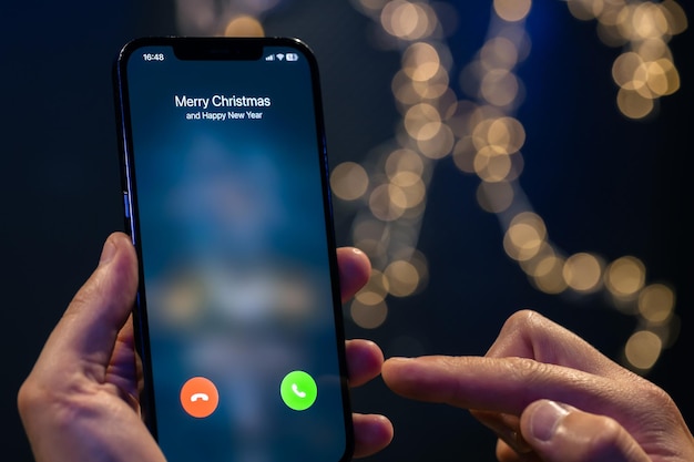Free photo incoming call screen from merry christmas close up