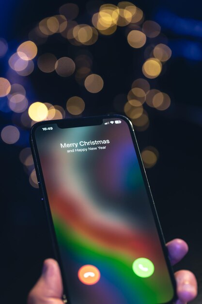 Free photo incoming call screen from merry christmas and happy new year close up