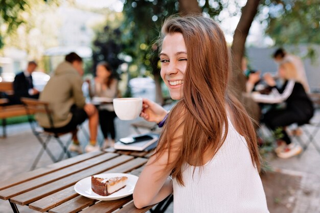 Incredible modern pretty woman relaxing outside