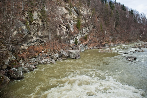 Incredible and stormy Prut river at Carpathian mountains Jaremcze resort Ukraine Europe