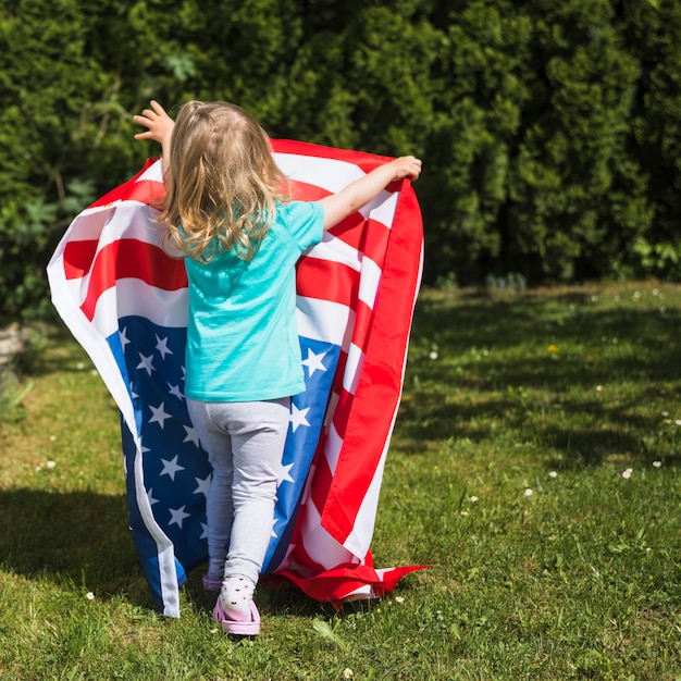 Independence day concept with girl in garden