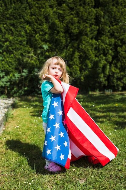 Independence day concept with girl in garden