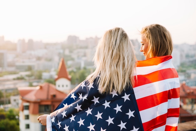 Independence day concept with girls on rooftop