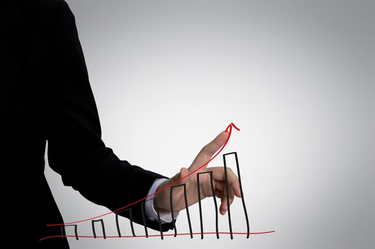Free Photo index finger touching a graph with a red arrow