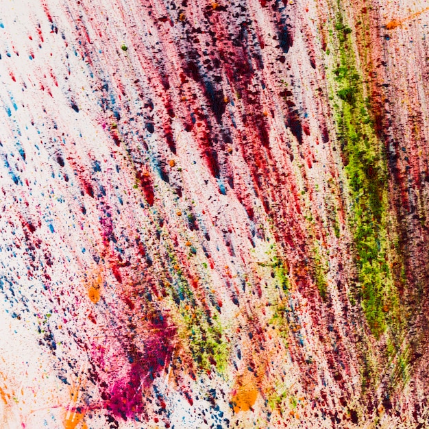 Indian colorful holi powder splashing on white background