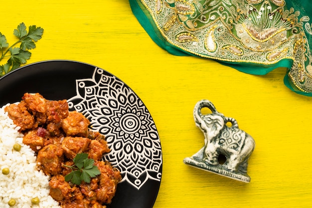 Free photo indian food assortment with sari flat lay