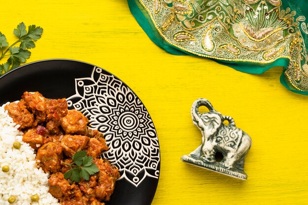 Indian food assortment with sari flat lay