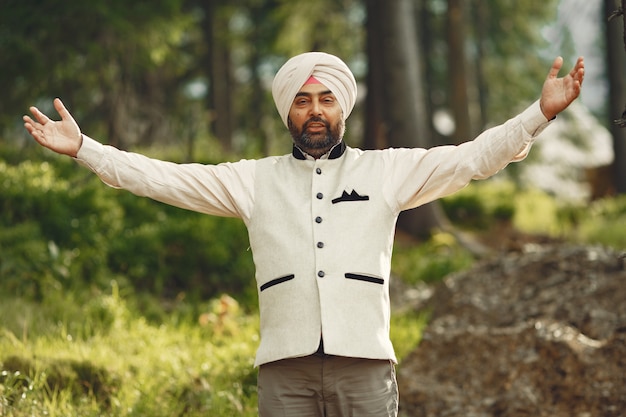 Free photo indian man in a mountains. male in a traditional turban. hinduist.