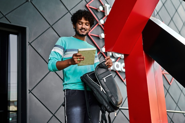 Indian student pulls out his favorite book