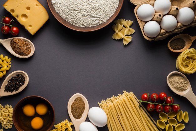 Ingredients for pasta on gray