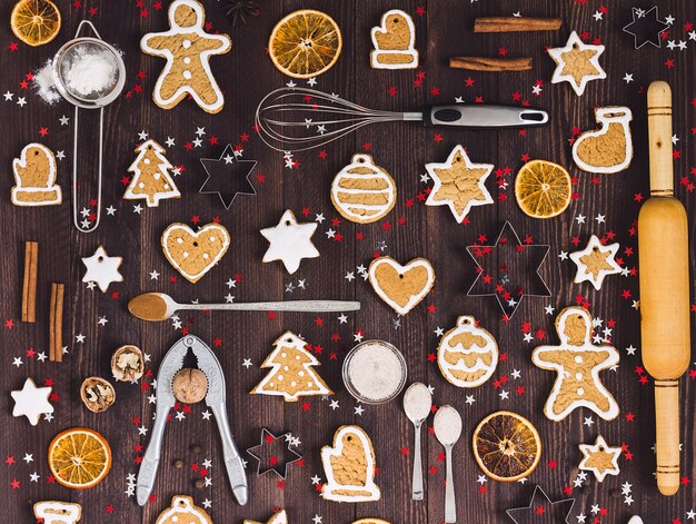 Ingredients and tools for baking christmas gingerbread cookies
