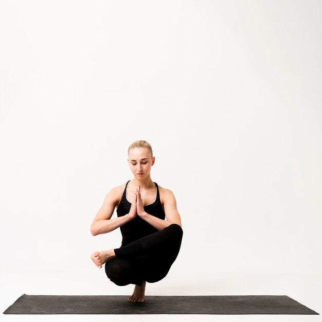 Free photo inner balance while standing on one leg