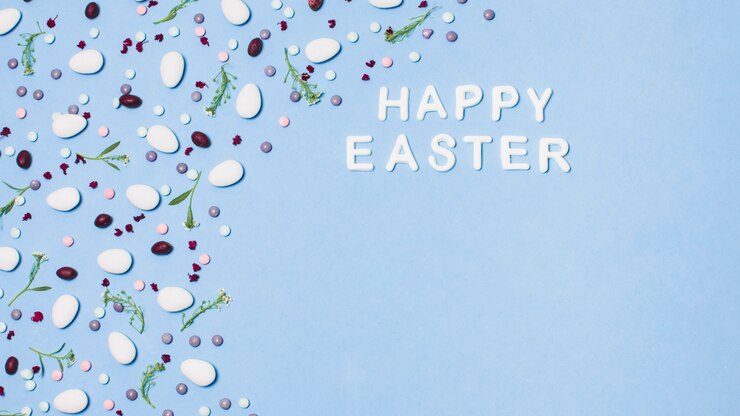 Free Photo inscription happy easter decorated by dragees and flowers