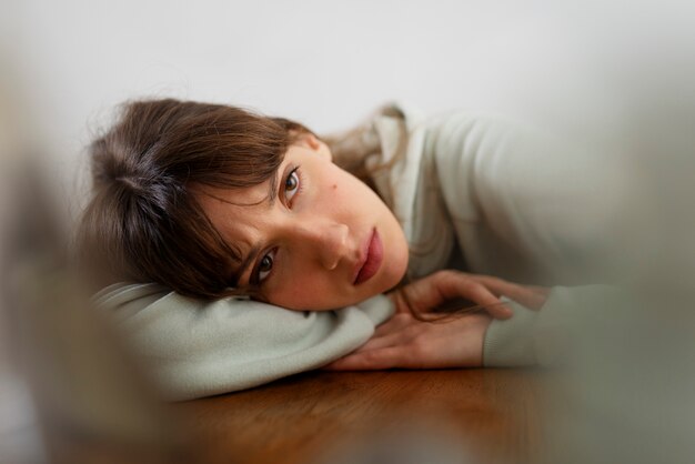 insecure woman indoors front view