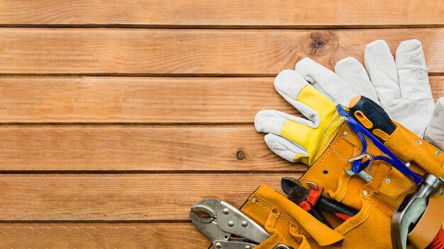 Instruments of carpenter on wooden table