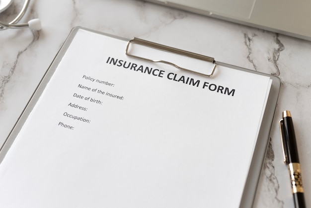 Insurance claim form high angle