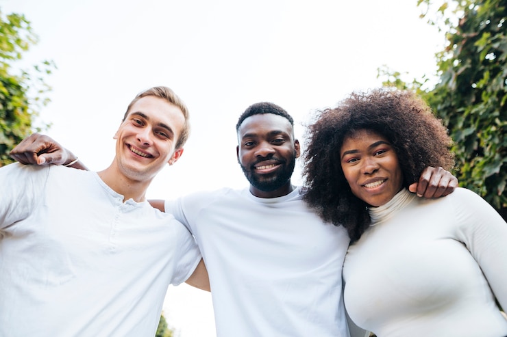 Free Photo intercultural friends looking at camera
