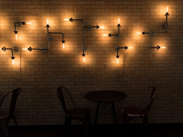 Free photo interior of a cafe with brick walls