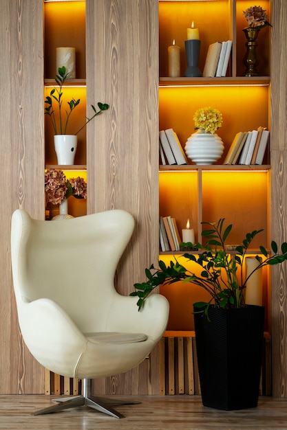 Free photo interior design with armchair and potted plant