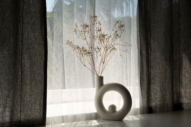 Бесплатное фото Дизайн интерьера с красивой вазой