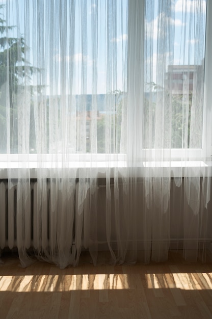 Free photo interior design with long curtains