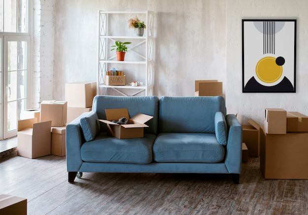 Free photo interior design with photoframe and blue couch