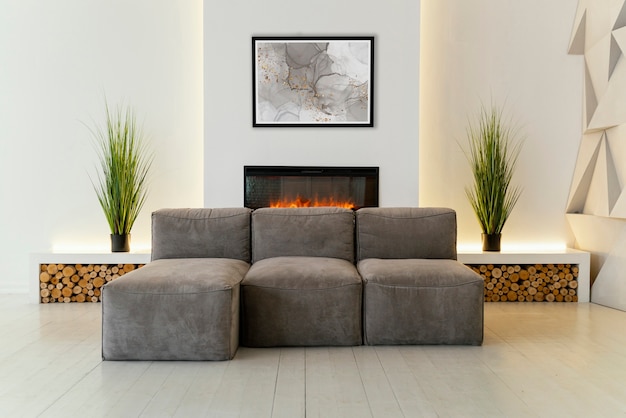 Interior design with photoframes and comfortable couch