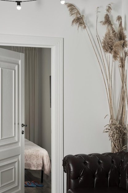 Interior details of apartment bedroom in minimalist design selective focus vertical frame