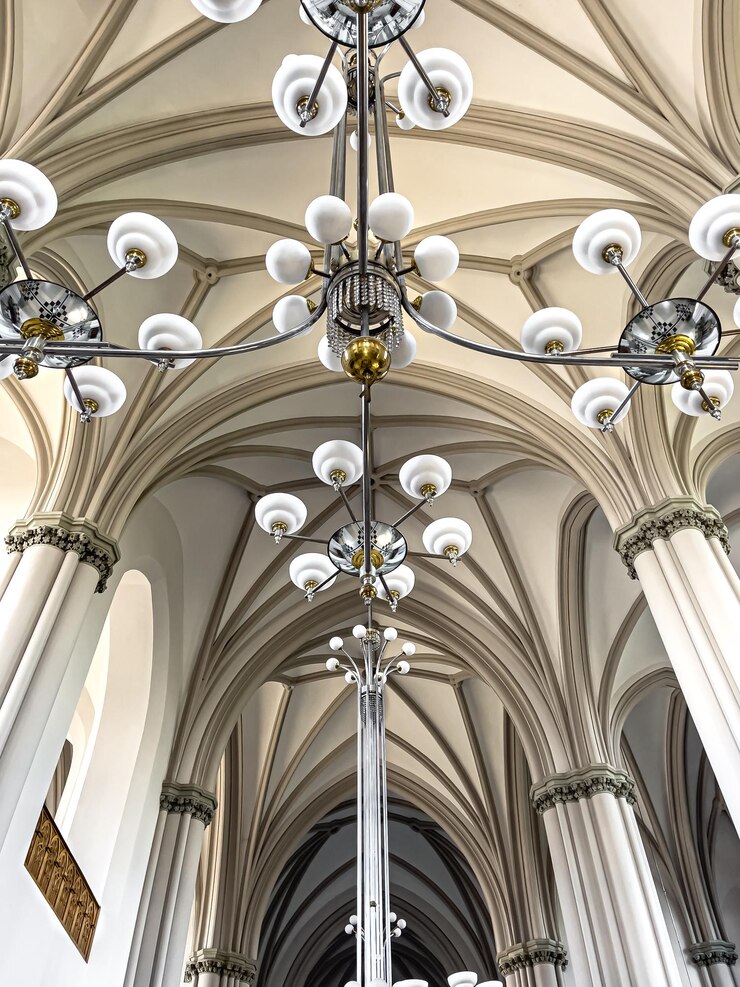 Free Photo interior details inside the church lamps and stainedglass windows