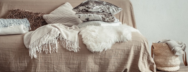 interior of the living room with a sofa and decorative items .