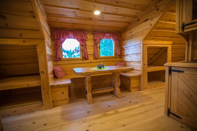 Free photo interior of a log cabin accommodation at lake bloke, nova vas, slovenia