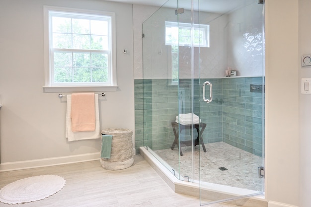 Interior of a modern bathroom with a shower box