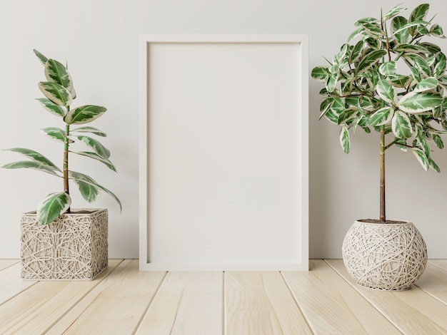 部屋に植木鉢を備えたインテリアポスターモックアップは、後ろに白い壁があります。3dレンダリング Premium写真