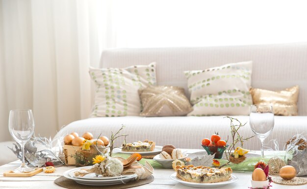 The interior of the room with a festive Easter table