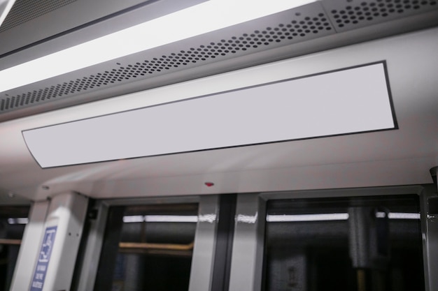 Free photo interior of subway train's ceiling