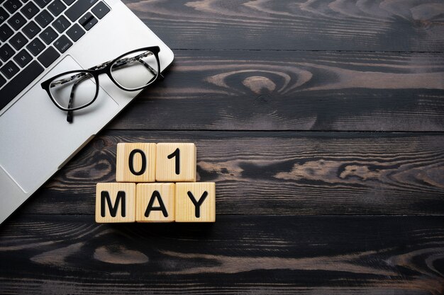 international worker's day with device on desk