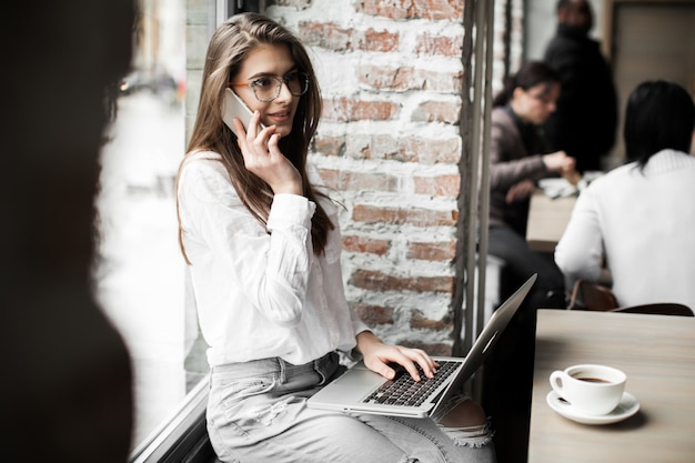 Free photo internet working using woman computer